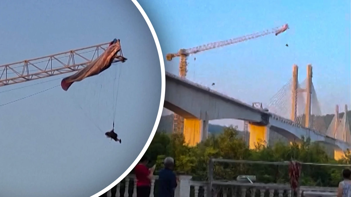 Doodeng: paraglider komt metershoog in kraan vast te zitten