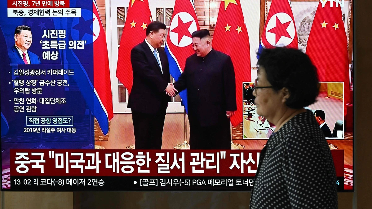 Kim Jong-un ontvangt Chinese leider Xi op vliegveld: ’Onbreekbare vriendschap’