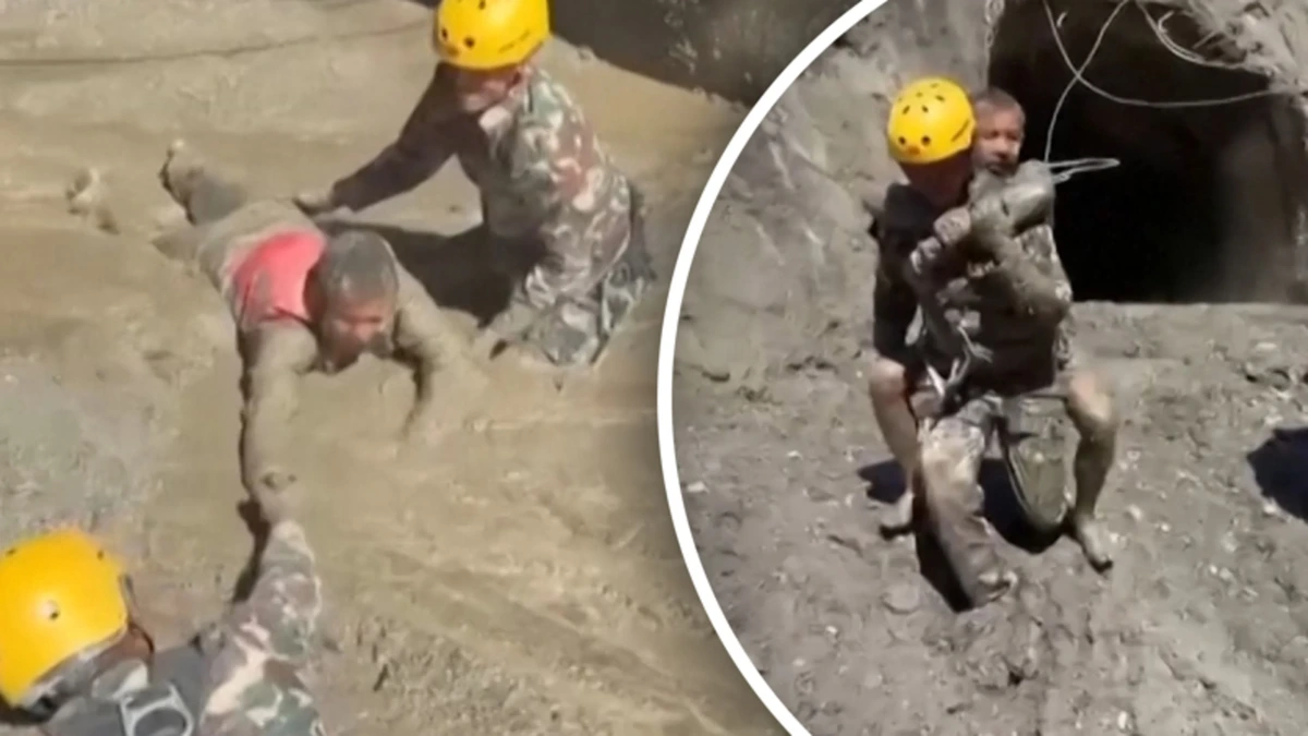 Mensen worden uit de modder getrokken tijdens reddingsactie in Nepal