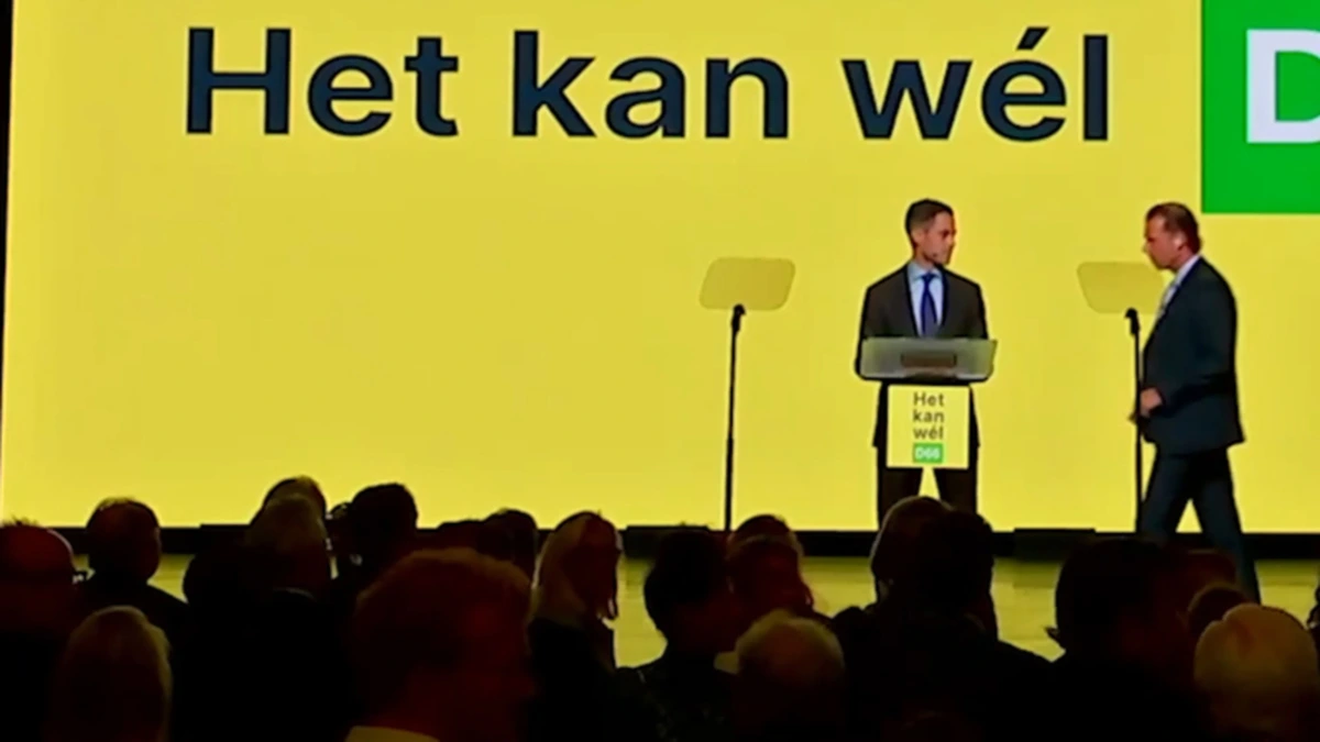 Hier wordt Rob Jetten van podium gehaald tijdens D66-congres