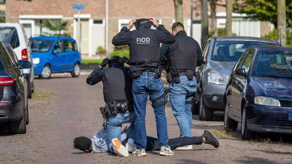 Aanhoudingen en doorzoekingen in Eindhoven om drugs en witwassen, verdachte deed vluchtpoging